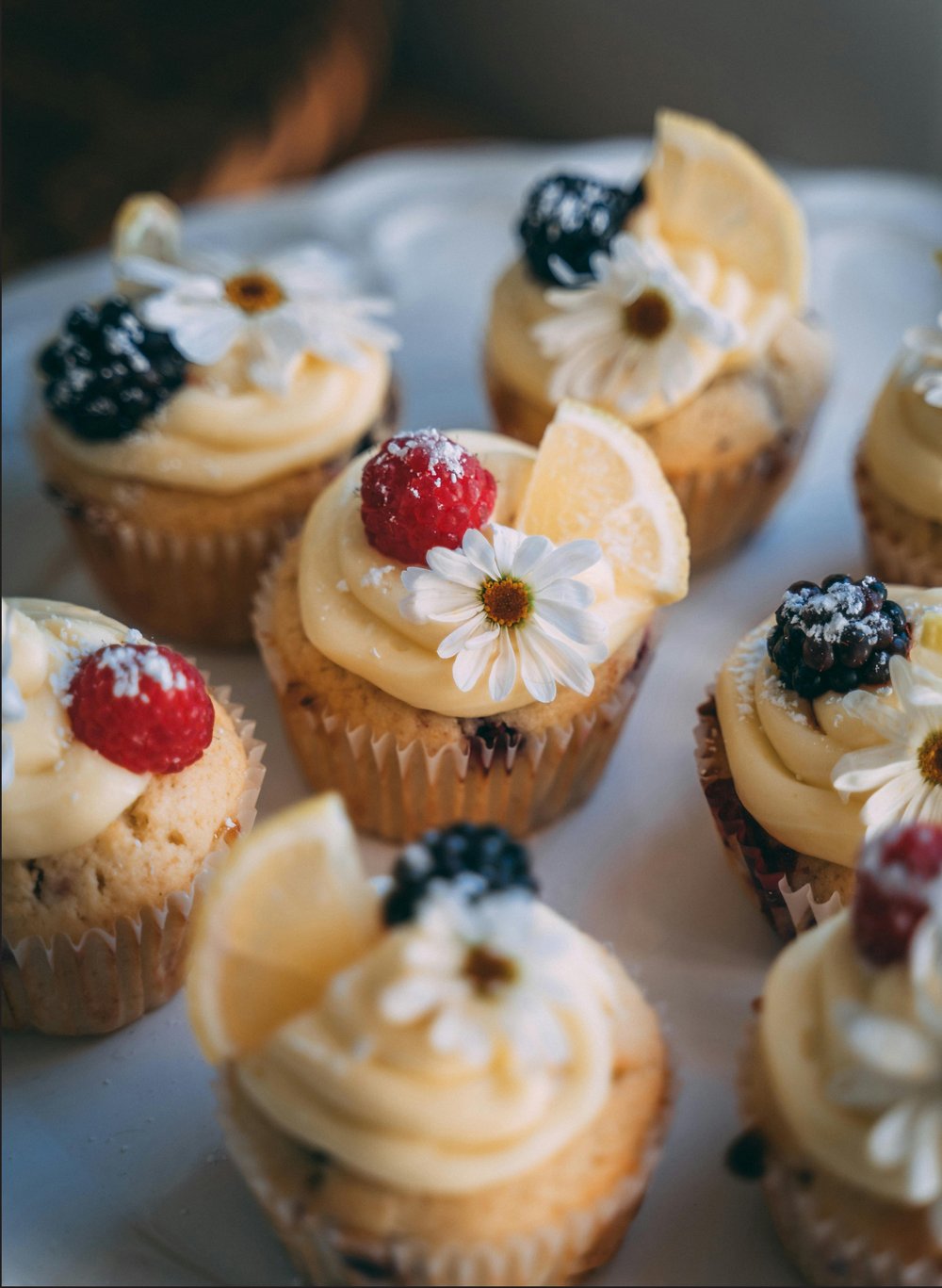 Page 5 — full-bleed cupcakes photo